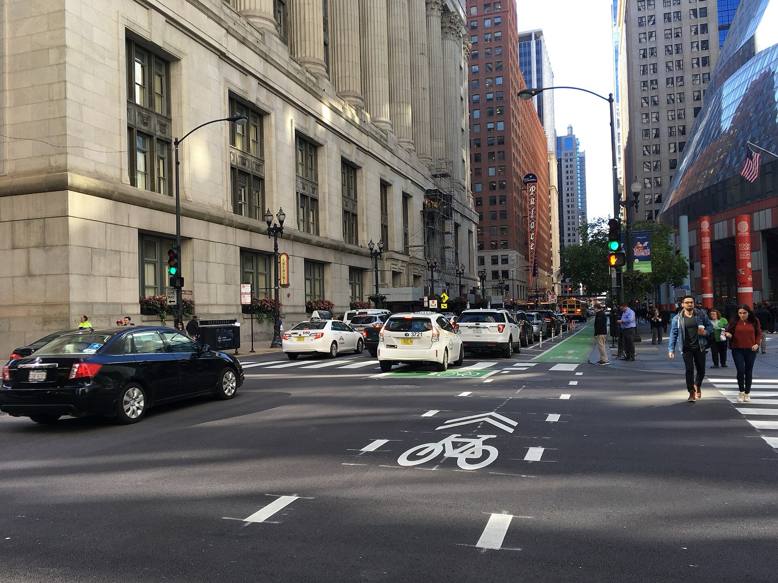 A protected bike lane extended across a Chicago intersection